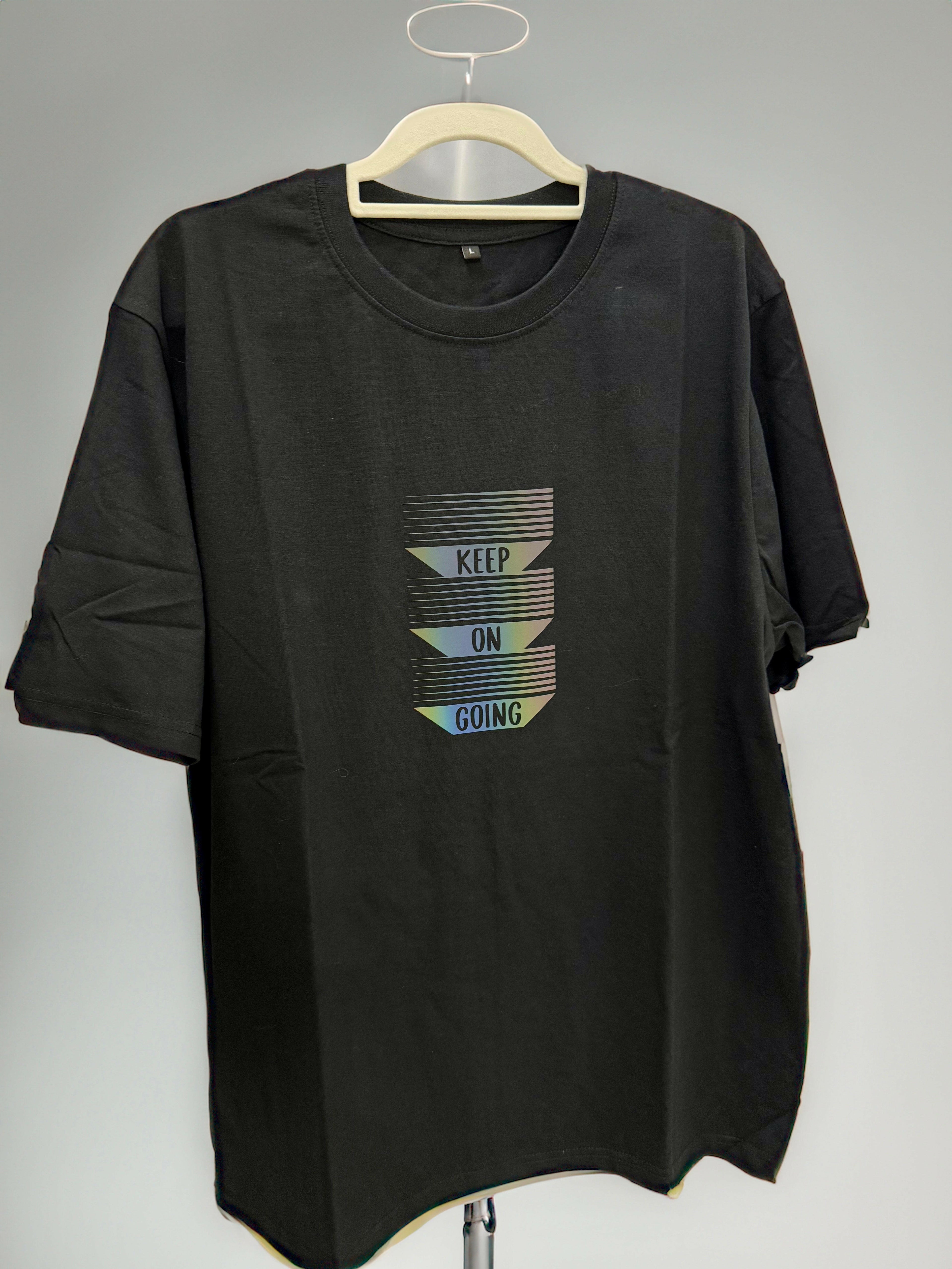 Keep Going cotton t-shirt with reflective matte graphic, stylish and functional for spring/summer.