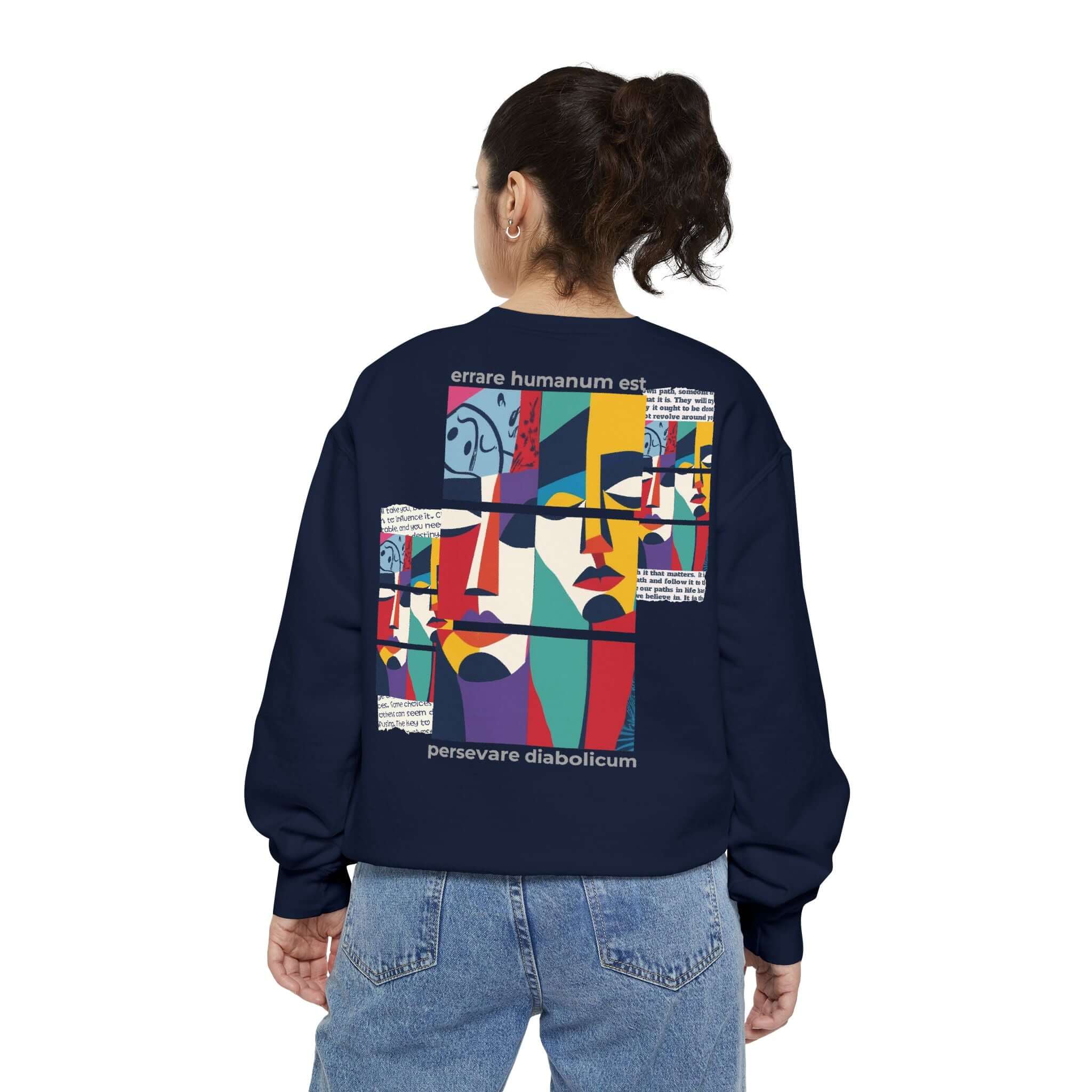 Unisex motivational sweatshirt with colorful abstract design and inspiring text on the back, perfect for comfort and style.