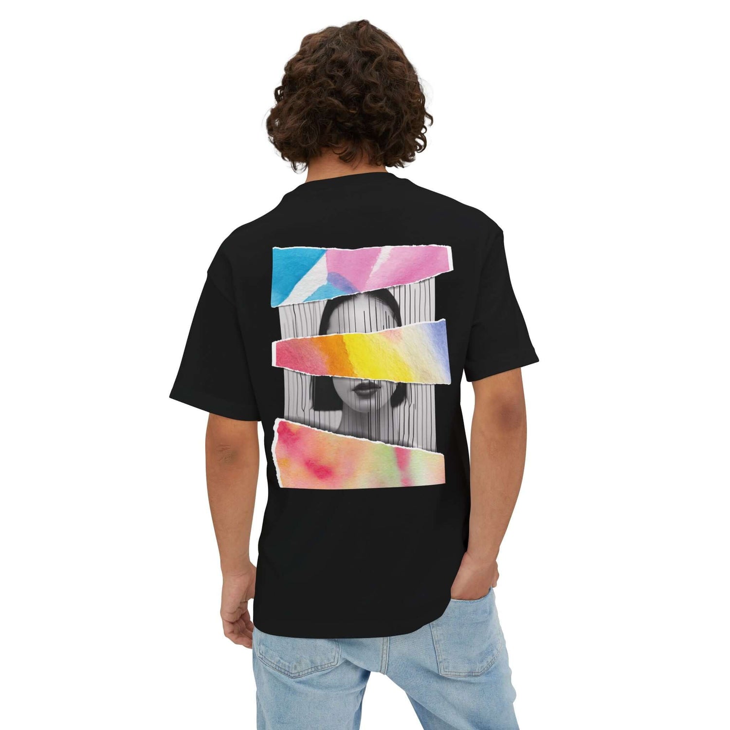 Back view of a unisex oversized black tee featuring a bold artistic design with watercolors and abstract elements.