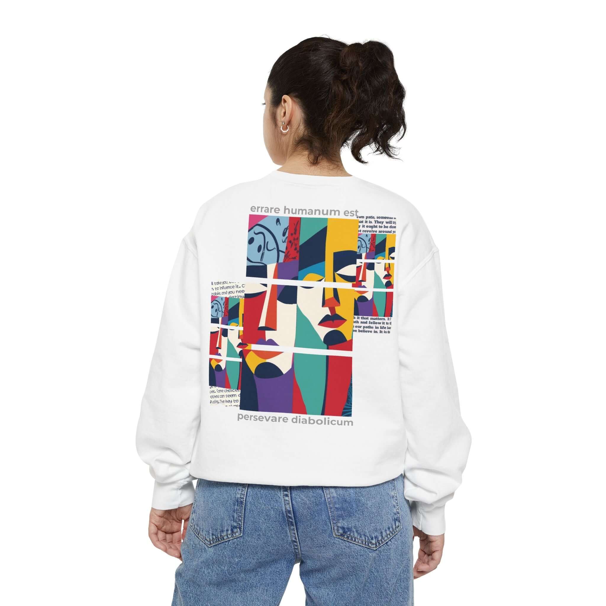 Unisex garment-dyed sweatshirt featuring colorful abstract design and motivational text on the back.