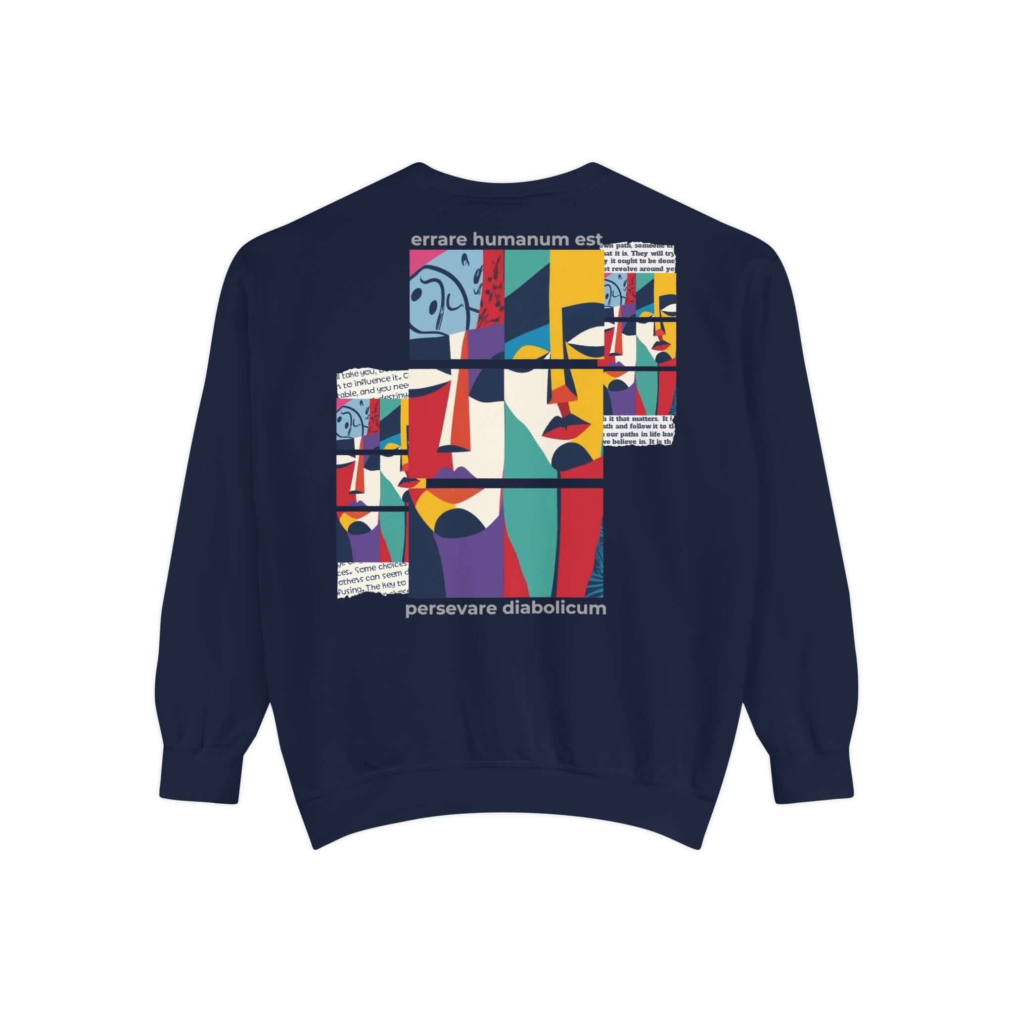 Colorful unisex sweatshirt featuring motivational art design with abstract faces and inspiring text on a navy background.