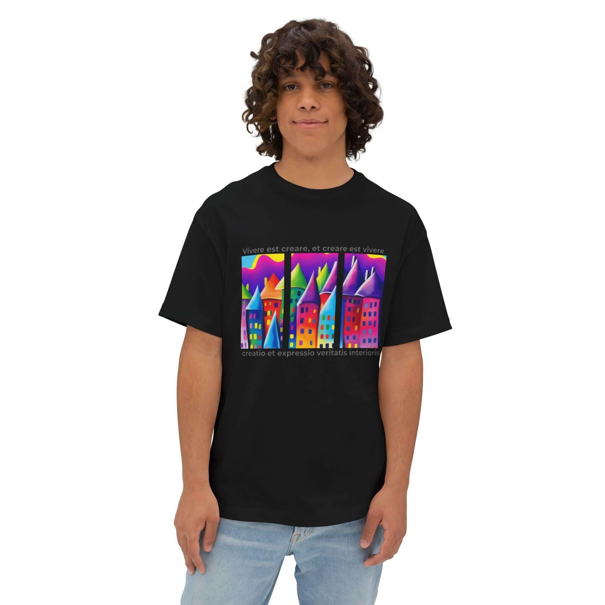 Unisex oversized tee featuring vibrant artistic design with colorful houses, perfect for casual wear and art enthusiasts.